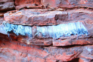 crocidolite asbestos fibers in a rock formation