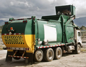 a garbage truck at a recycling facility