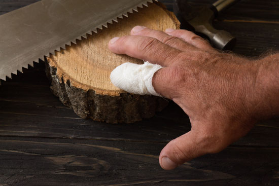 Los Angeles amputation injury attorney can assist this worker whose finger was partially cut off with a saw