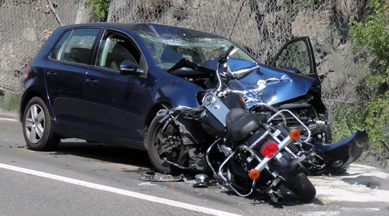 Los Angeles motorcycle accident attorney can assist the victims of this crash involving a cruiser bike and a blue car