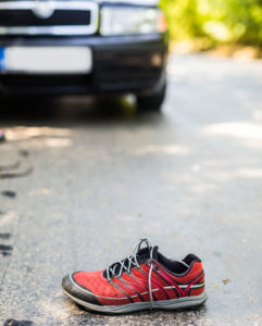 Los Angeles pedestrian accident lawyer can help the victim whose red shoe was left on a street after an accident