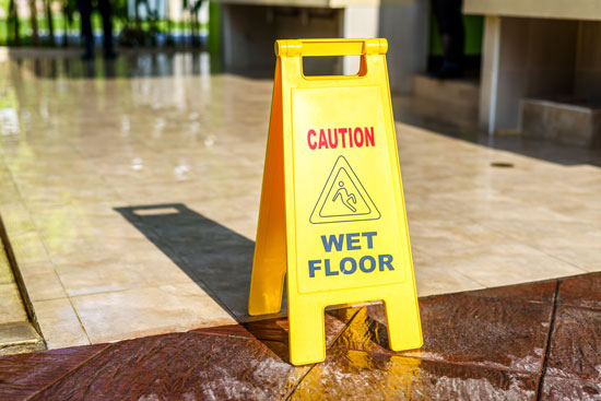 Los Angeles slip and fall attorney can assist if this wet floor sign is removed while the floor is still wet