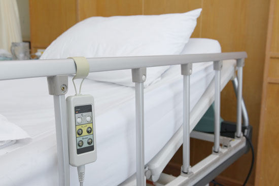 a hospital bed with raised side rails is a form of abuse that nursing home physical restraint attorney fights against