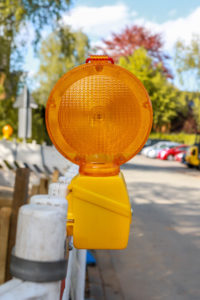 yellow pedestrian activated flashing beacon