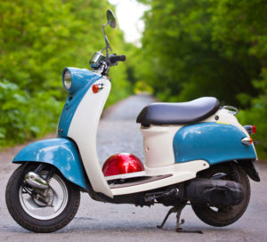restored blue and white vintage scooter