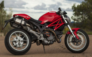 side view of a powerful red Ducati sport bike