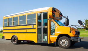side view of a small type A school bus