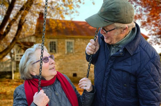 elderly man and woman socializing