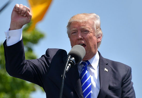 President Trump with a raised hand symbolizes his optimism regarding President Trump's COVID-19 diagnosis and his age